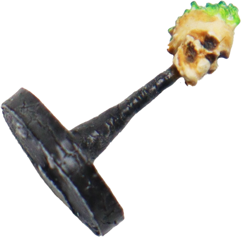 A 3d-printed miniature of a Flameskull monster from the dnd monster manual, used during combat encounters on a grid map.